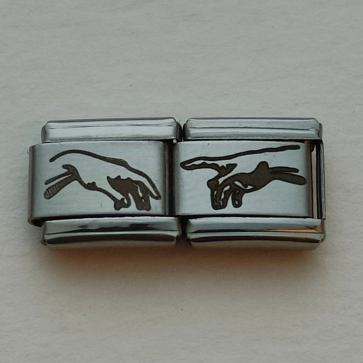 The Creation of Adam Matching Charms
