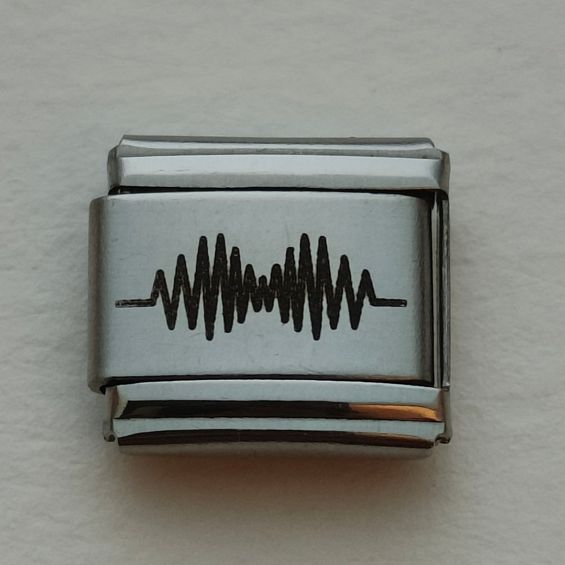 Arctic Monkeys Silver Charm