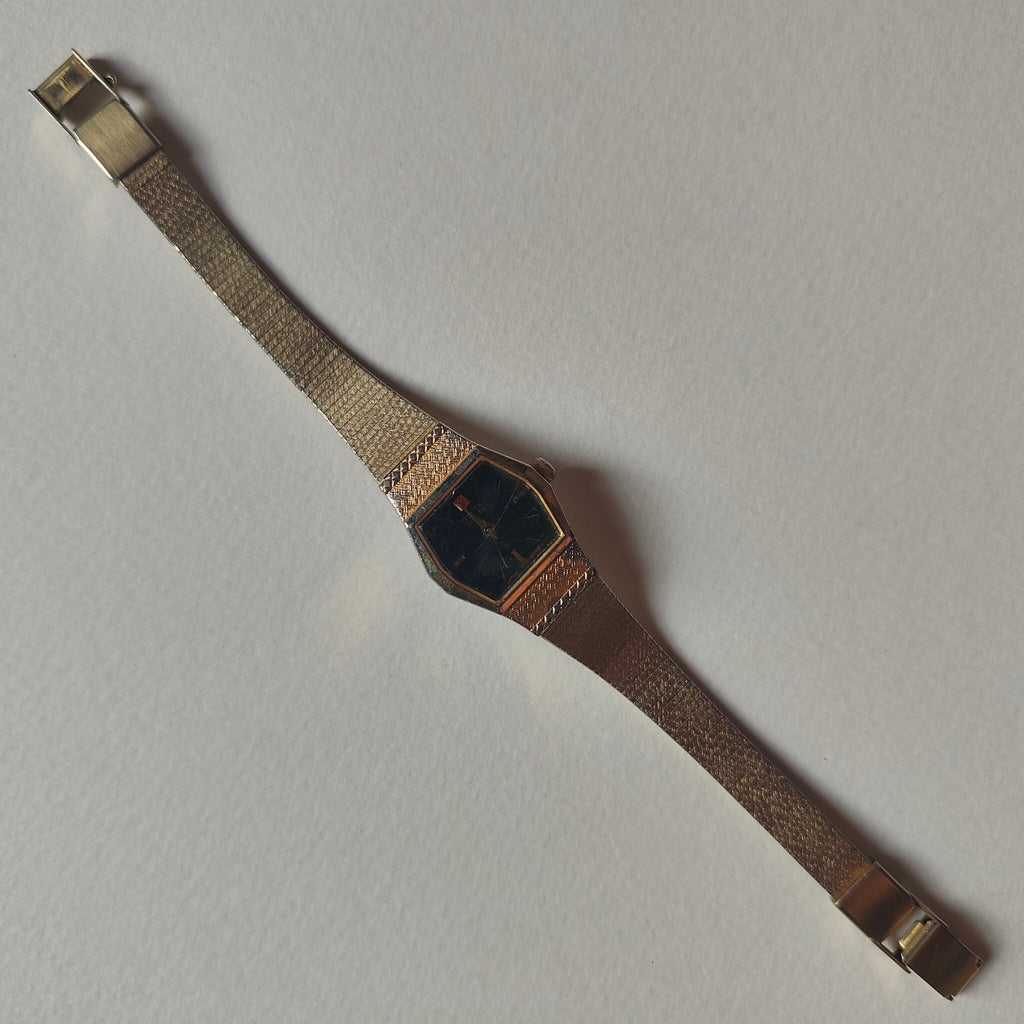 Red and Black Dial Orient Watch -not working