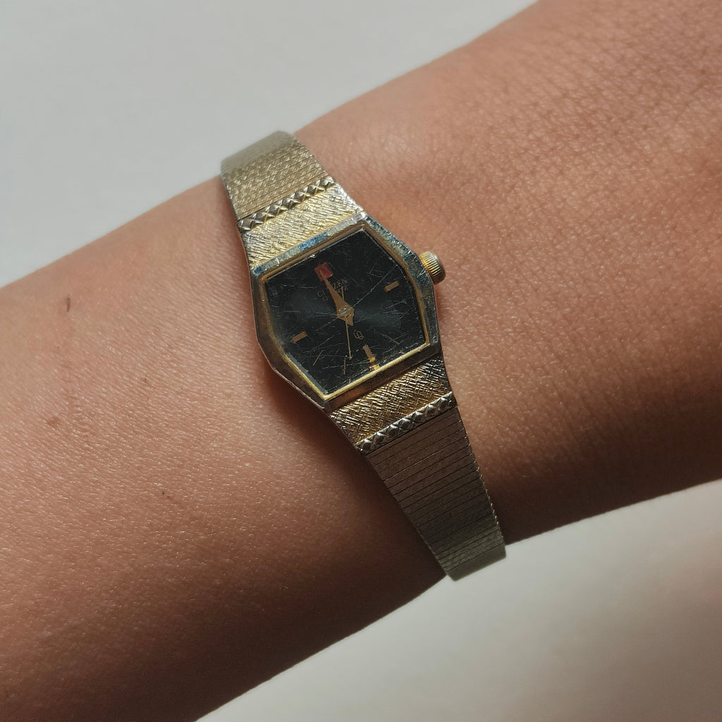 Red and Black Dial Orient Watch -not working