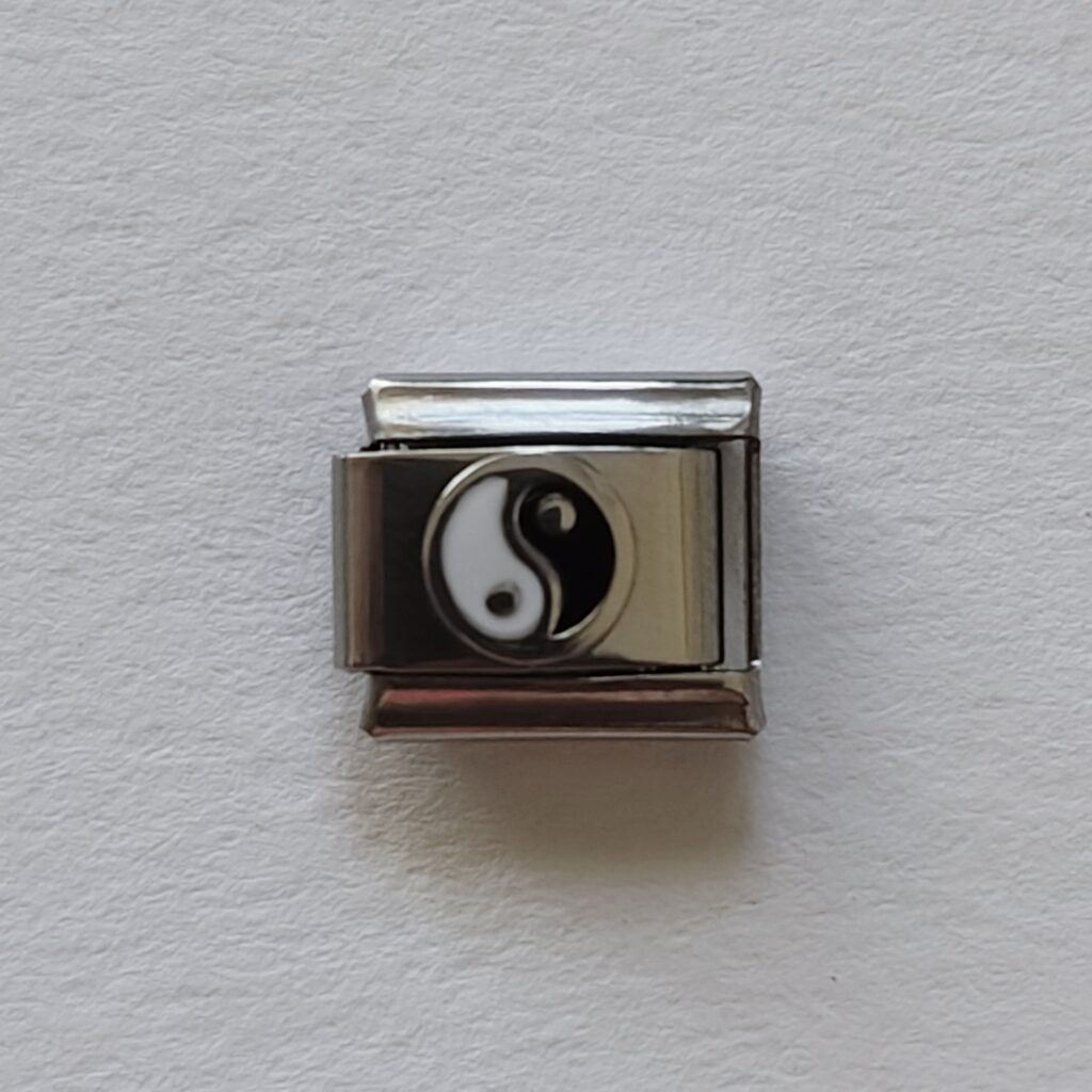 Yin-Yang charm