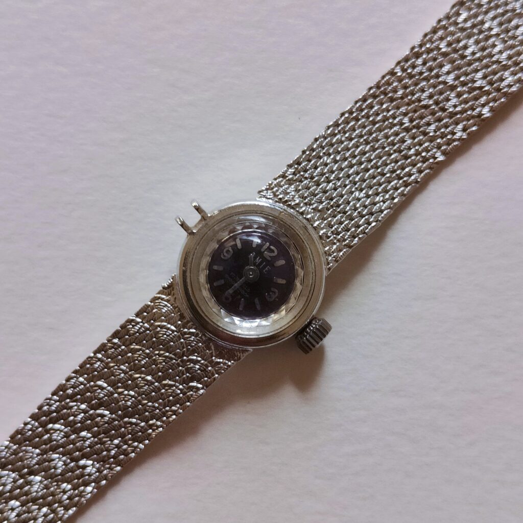 Tiny Round Silver Watch