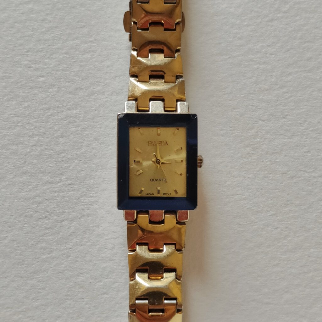 Blue frame gold watch