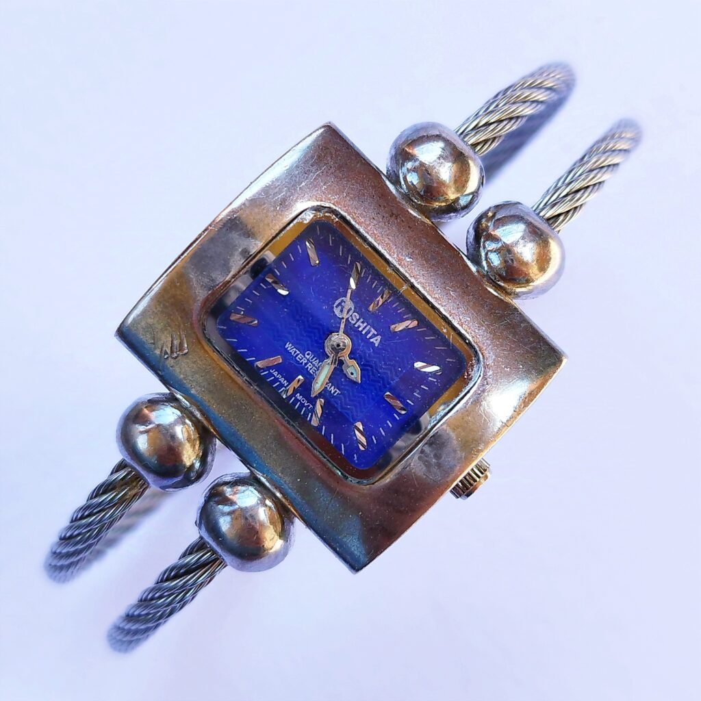 Blue dial cuff watch -not working